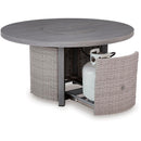  Signature Design by Ashley Half Moon Beach PCP418-776 Round Fire Pit Table IMAGE 2